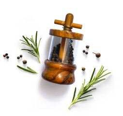 Wall Mural - traditional italian pepper shaker and green organic rosemary leaves isolated on white background. Transparent background and real natural transparent shadow; Ingredient, spice for cooking. collection 
