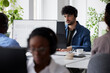 © Johnér - Young man using headset while sitting in office