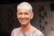 © Johnér - Portrait of smiling mature woman with short hair