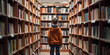 © xartproduction - A child among the librarys shelves.