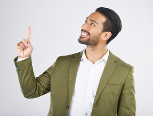 Poster - Businessman, thinking and happy man pointing for promotion, deal and logo isolated in studio white background. Choice, corporate and person or employee showing advertising or news with smile
