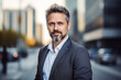 © Keitma - Portrait of a 40 years old man, light unshaven, casual business style with suit shirt but no tie , modern city background