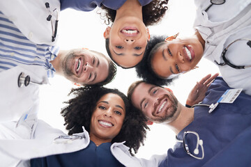 Aufkleber - Happy people, portrait and doctors in huddle, teamwork or unity in healthcare mission together below. Low angle of excited group of medical professionals smile in team building, support or goals