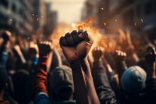 Raised fist of afro american man in large angry protest riot crowd of people