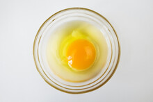 Raw Egg, Top View Of One Raw Egg In A Glass Bowl