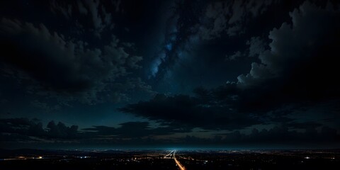 Wall Mural - Time lapse of clouds over the city. Black, blue night sky with clouds. Dark teal skies background with copy space for design. Wide banner. Gloomy dramatic sky scene.
