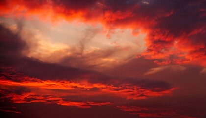 Wall Mural - red clouds in the sky. bright red sunset. Dramatic evening sky with clouds. Nature, sun, orange, sunrise, red, evening.