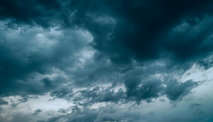 Wall Mural - Dark teal cloudy sky. Night skies with clouds. Gloomy sky background for design. Sky, clouds, cloud, blue, nature, storm.