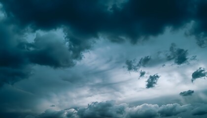 Night skies with clouds. Gloomy sky background for design. Dramatic ominous thunderstorm. Cloud, blue, nature, weather, storm, cloudscape.