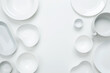 © matucha12 - Set of different pure white dishes for home or restaurant on white background. Top view, flat lay, copy space