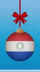 Wall Mural - Snow falling on christmas ball with flag of Paraguay