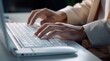 © Gegham - close-up of person is typing on the keyboard, programmer is programming on the computer keyboard, person typing on a laptop