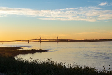 Wall Mural - The Deh Cho Bridge crosses the might Mackenzie River near Fort Providence, Northwest Territories, Canada