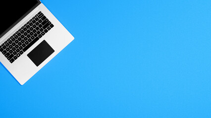 Aufkleber - Top view laptop mock up on empty blue table background, empty place, table - can be used for text or design