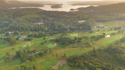 Wall Mural - Aerial view on a nice hole in the morning on a golf club in Quebec, Canada