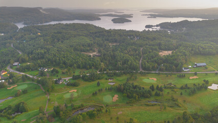 Wall Mural - Aerial view on a nice hole in the morning on a golf club in Quebec, Canada