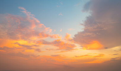 Wall Mural - Sunset sky. Abstract nature background. Dramatic blue with orange colorful clouds in twilight time.