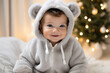 © Tetiana - Generative AI picture cute adorable little baby toddler age wearing first christmas time sleeping costume