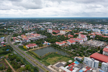 Poster - Aerial view of local residential neighborhood roofs. Urban housing development from above. Top view. Real estate in Isan urban city town, Thailand. Property real estate.