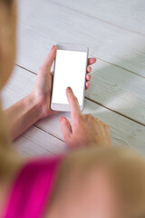 Canvas Print - Digital png photo of caucasian woman using smartphone with copy space on transparent background