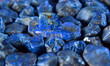 Lapis Is a beautiful natural gemstone on a wooden floor