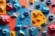 Indoor climbing wall adorned with vibrant holds, demarcating varying degrees of difficulty, inviting climbers to test their skills