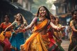 © Denis - Indian women dancing on the streets in traditional dresses