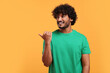 © New Africa - Handsome smiling man on yellow background, space for text