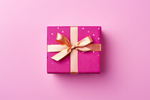 Pink Gift Box With Ribbon On A Pastel Pink Background 