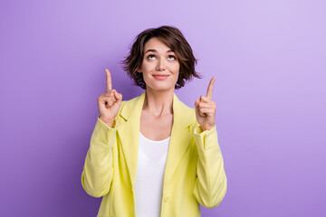 Wall Mural - Portrait business investor woman indicating fingers up above head enjoy save money crypto market isolated on violet color background