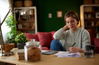 © Stockphotodirectors - Women using digital tablet to check her finances at home office