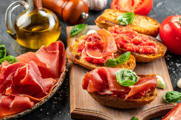 Wall Mural - Toast with tomato and Olive oil and jamon ham, traditional Spanish breakfast