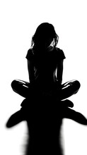 Black And White Silhouette Of A Skinny Girl Sitting Hunched Over. Concepts Of Abuse, Hopelessness, Trauma, Homelessness, Loneliness And Violence