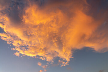 Wall Mural - beautiful orange cloud in the sky at sunset, sky remplacement, nature background
