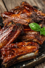 Poster - Pork ribs in barbecue sauce. vertical image. top view. place for text