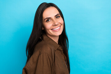 Poster - Portrait photo of cheerful gorgeous nice young girl brunette hair latin feminine student wear brown shirt isolated on blue color background