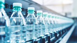 Fototapeta  - Line of bottling beverages in plastic bottles on clean light factory