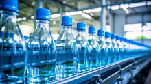 Line Of Bottling Beverages In Plastic Bottles On Clean Light Factory