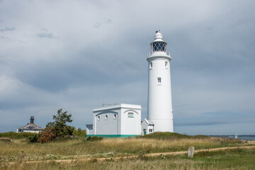 Wall Mural - Hurst Point Lighthouse is located at Hurst Point in the English county of Hampshire, and guides vessels through the western approaches to the Solent