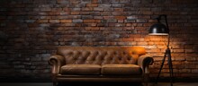 Cozy Couch And Lamp Against Brick Wall