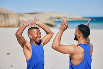 Happy man, friends and high five in fitness on beach for workout success, training or outdoor exercise. Excited male person smile in happiness, teamwork or sports motivation together on ocean coast