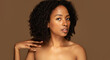 © Prostock-studio - Sensual beautiful topless young black woman touching shoulder, panorama