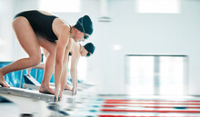 Sports, Swimming Pool Or People On Block To Start Jumping In Workout, Exercise Or Fitness Training. Women, Athlete Blur Or Swimmer On Board Ready To Dive In Water For Wellness Or Race Competition
