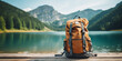 travel backpack on blurred amazing wild nature background. 
