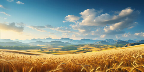 Scenic landscape of endless fields of ripe wheat against the backdrop of mountains