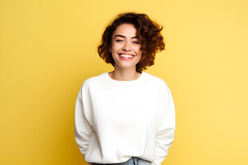 Wall Mural - Young woman wearing white sweatshirt mockup, at yellow background. Design pullover template, print presentation mock-up. Generated AI.