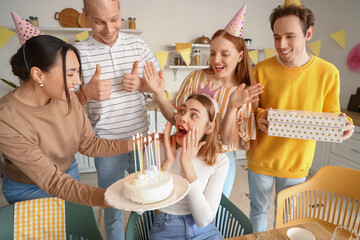 Sticker - Young woman bringing Birthday cake to her friend at party