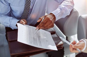 Lawyer, broker or HR manager signing a contract agreement with client or employee.