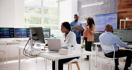 Poster - African Financial Data Analysts Using Dashboard On Screens