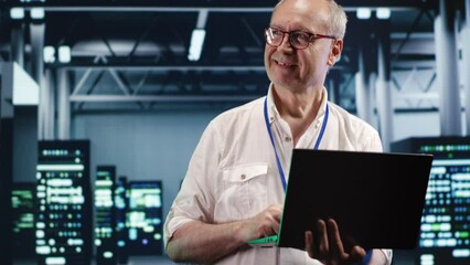 Poster - seasoned computer scientist expertly managing data while navigating in industrial server room. effic